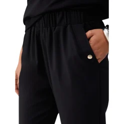 Pantaloni donna slim fit con risvolto