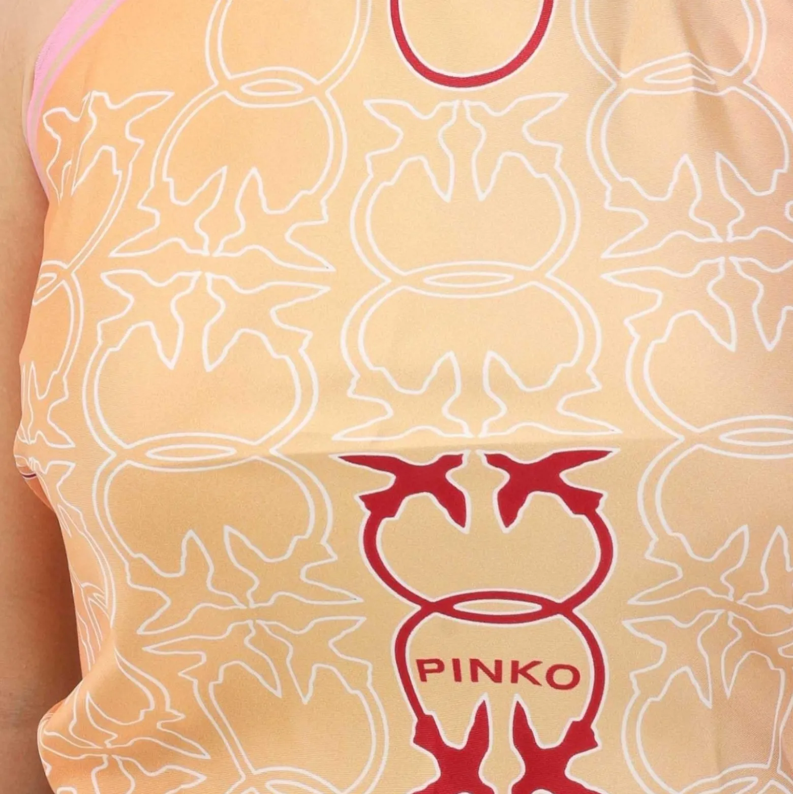 Top donna arancione e rosa con logo all-over