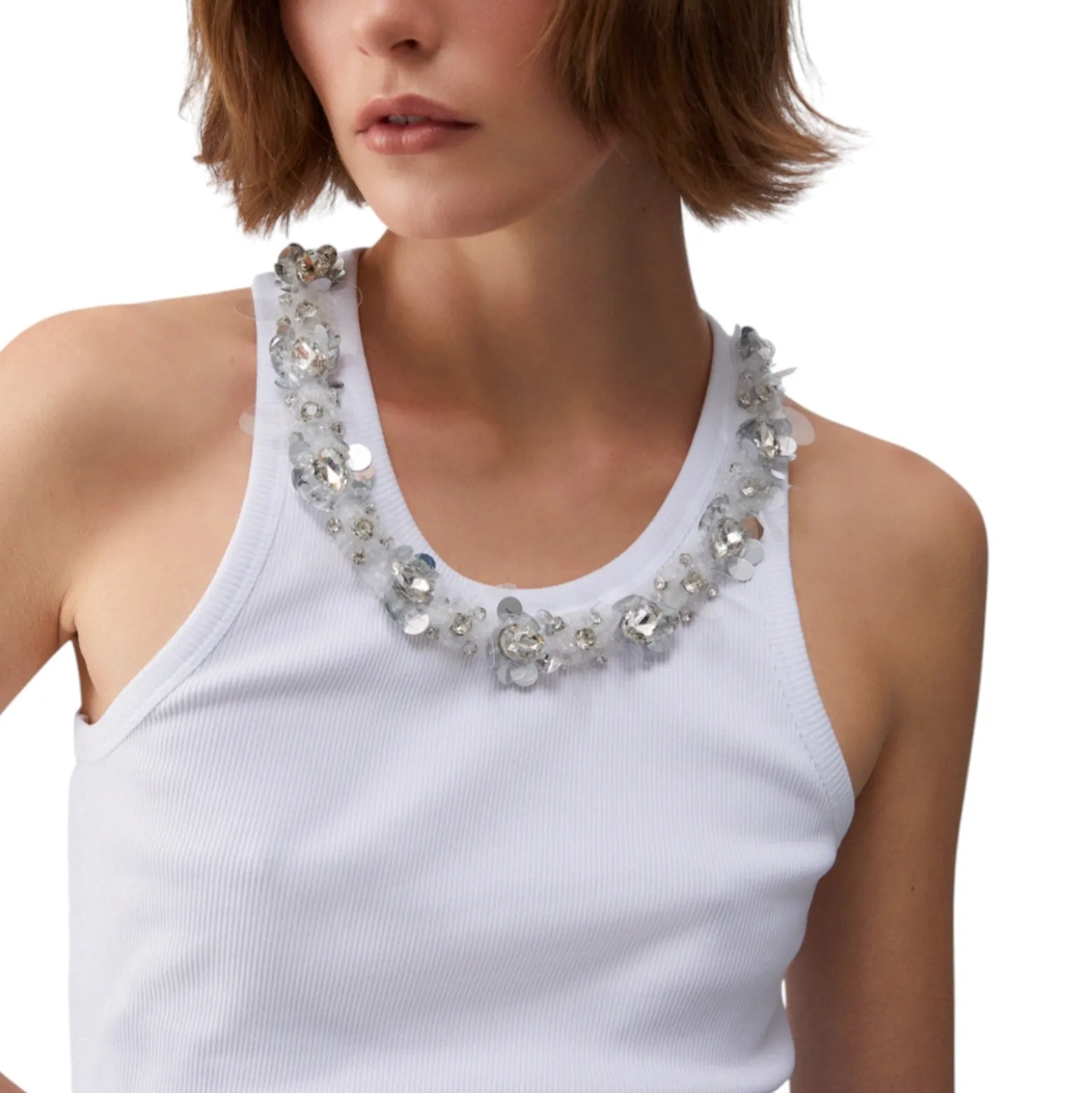 Top donna con dettagli gioiello